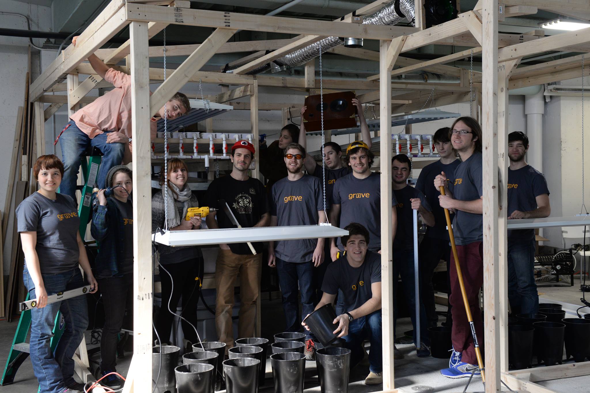The Grove team hanging out for a picture in the under-construction research farm, taken January 2014. I bet you can guess which person is Chad.